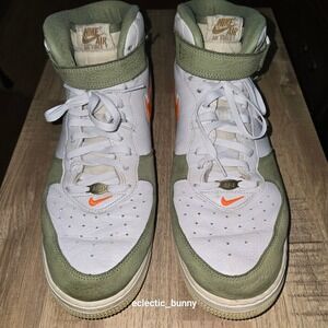 Nike Air Force 1 Mid-tops. White w/Olive suede overlay & Orange Swoosh accents.
